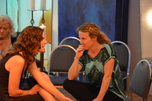 Grads Amy Shamansky and Elizabeth Jacobowitz share a "do -tell" moment...